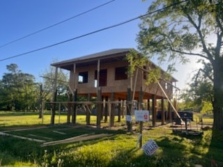 Custom piling home framing stage