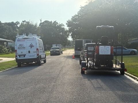 Rovira service vans and equipment on job site